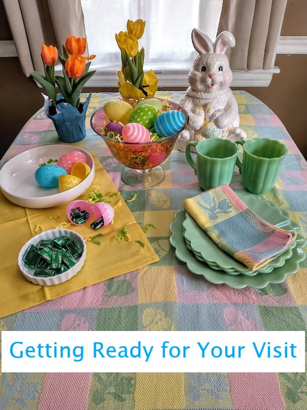 table set in easter theme getting party favors of plastic eggs filled with dinner mints tulips and bunny cookie jar on table