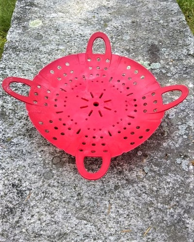 red silicone steaming basket