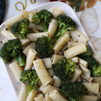 broccoli and rigatoni served on a platter