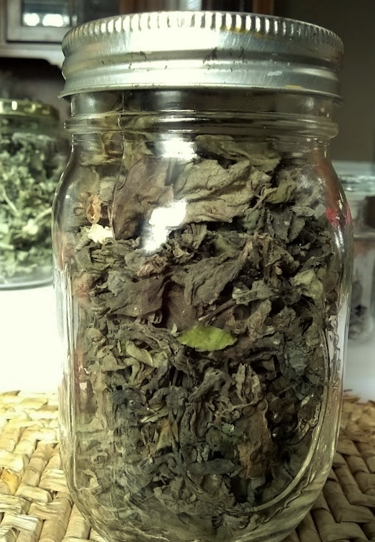 dried basil in a jar