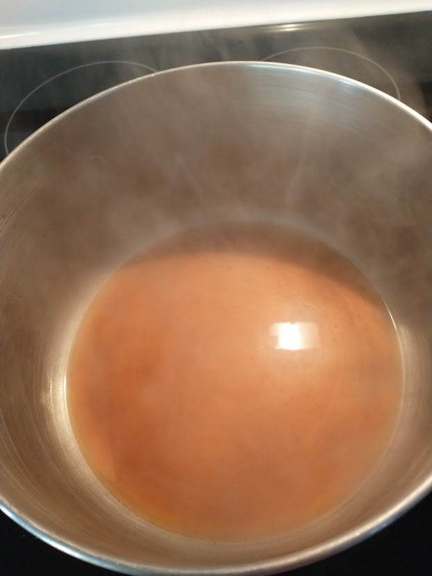 cider in saucepan steaming