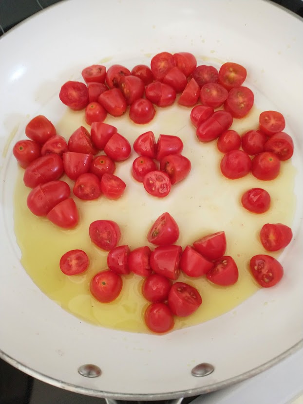 kids meal tomatoes and olive oil in skillet