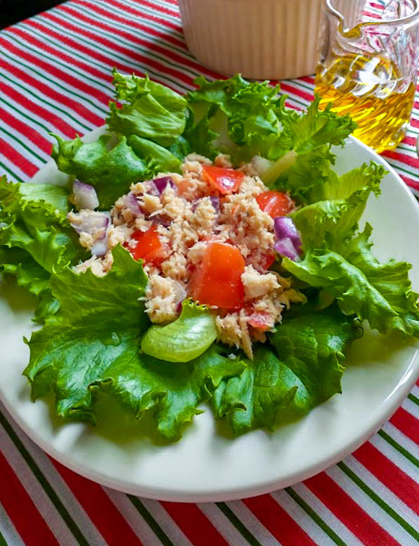 salad greens topped with italian tuna salad served with extra olive oil on the side