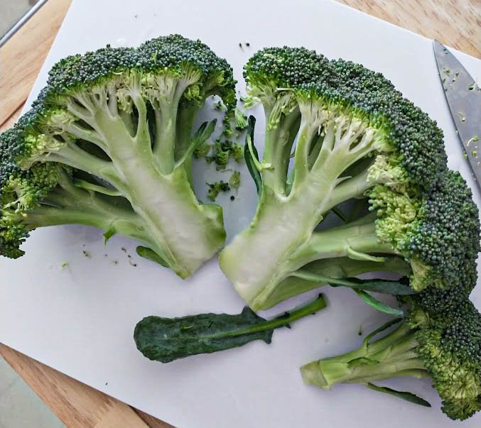 a head of broccoli cut through the middle
