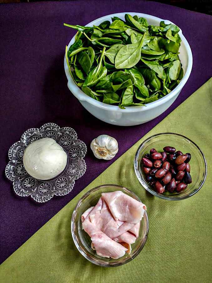 spinach saute ingredients spinach garlic ham mozzarella cheese kalamata olives