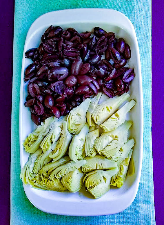 chopped kalamata olives and quartered artichoke hearts