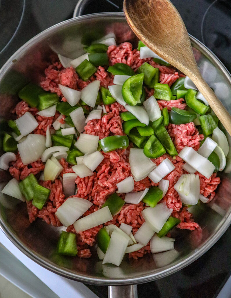 hamburg chopped green pepper and chopped onion in skillet