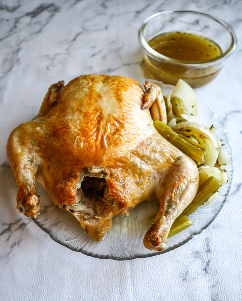 roasted chicken with roasted vegetables and drippings