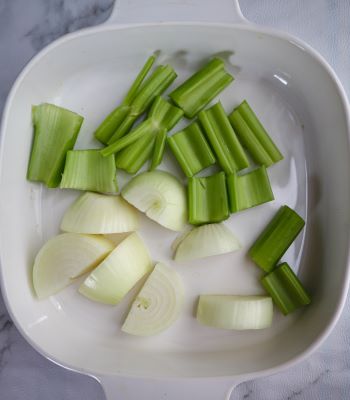 onion and celery in baking dish