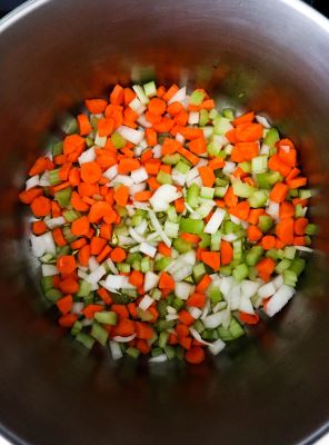 carrots celery and onion in pot