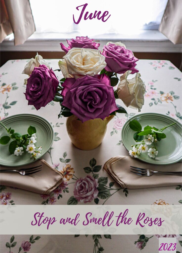 june 2023 dinner table stop and smell the roses with lavender and ivory roses