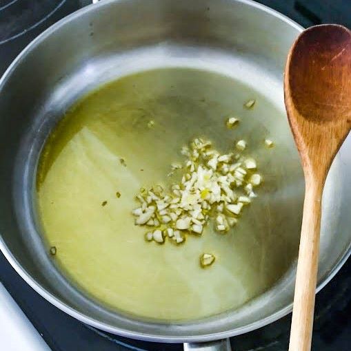 olive oil and minced garlic in skillet