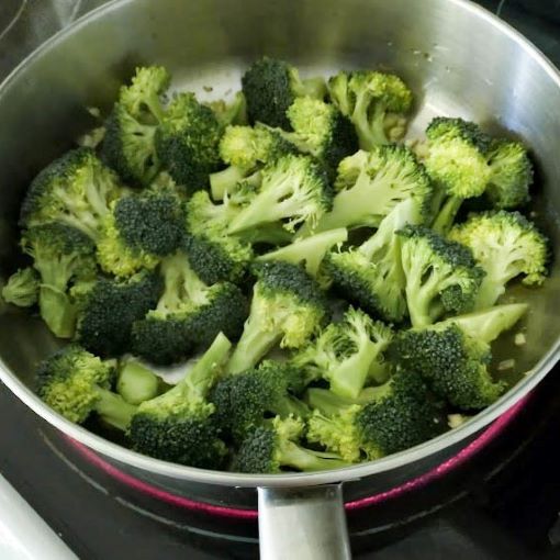 chopped broccoli in skillet uncooked