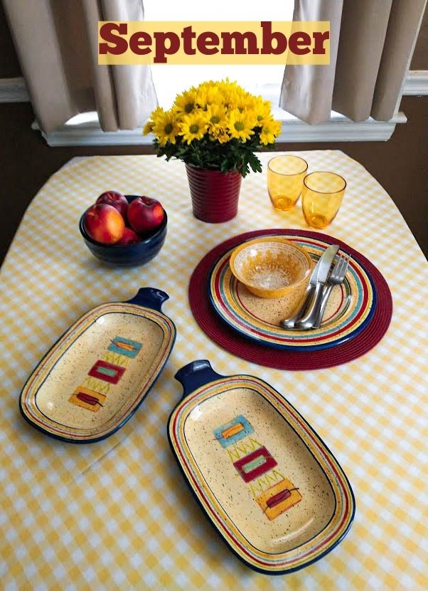 september dinner table setting in yellows and blues