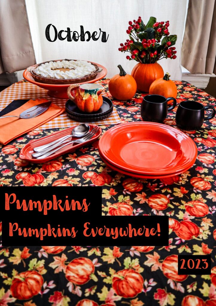 table setting of orange and black with pumpkin pie pumpkins and a tablecloth of pumpkins on a black background