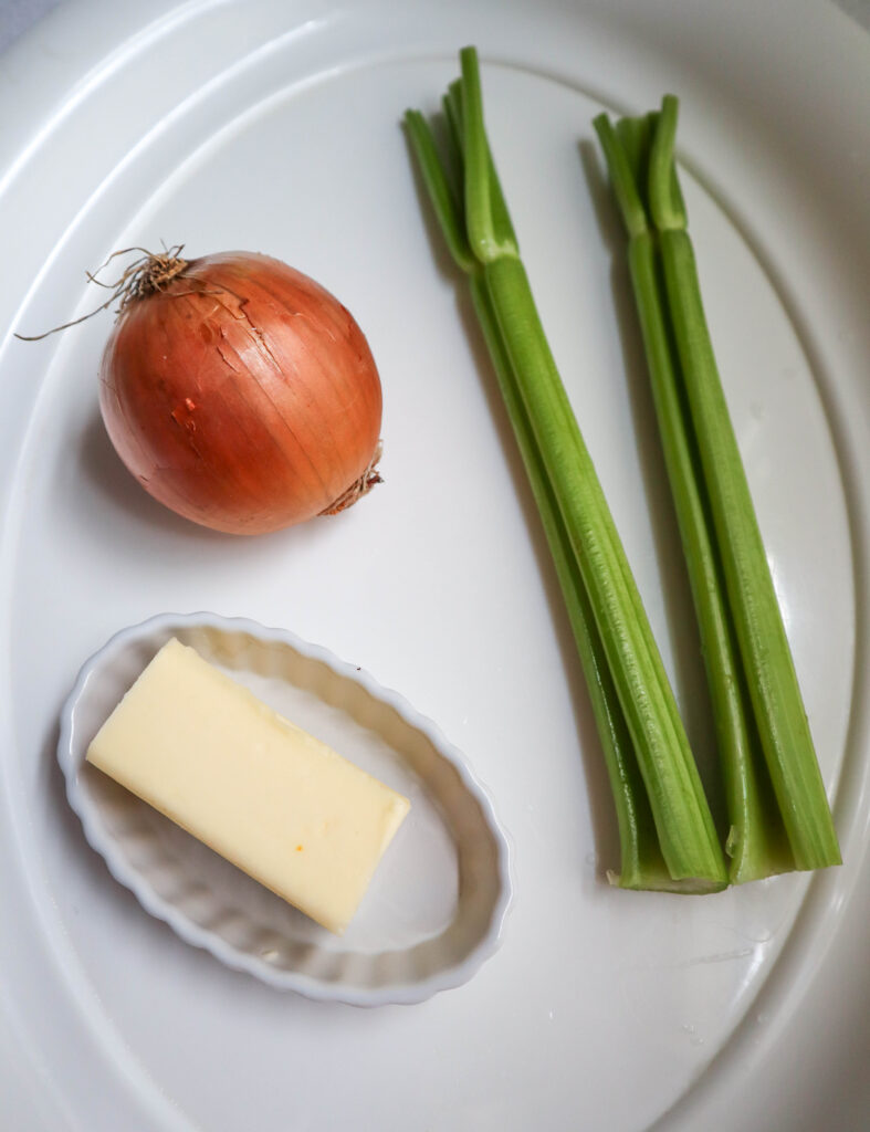 a medium yellow onion 2 stalks of celery and butter