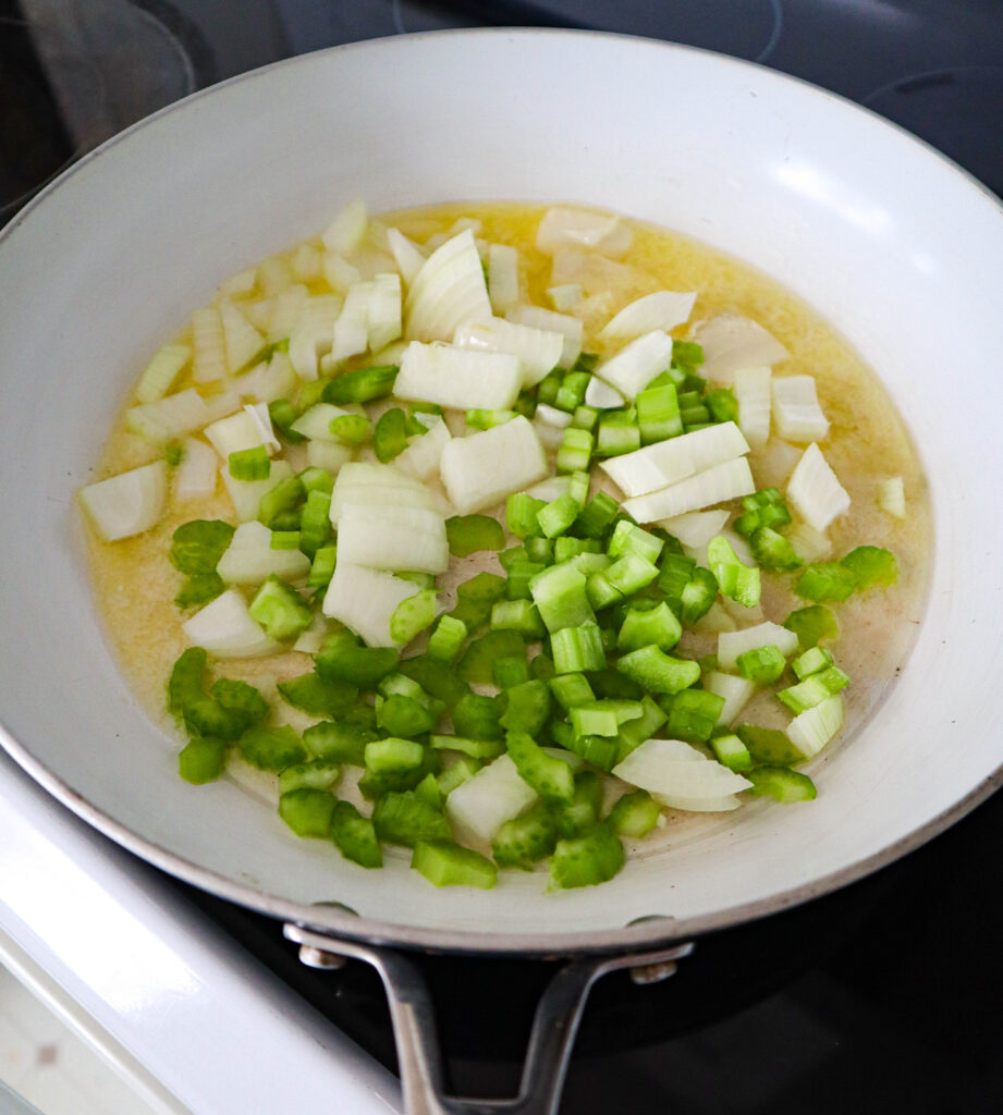 chopped  onion and celery in skillet with melted butter