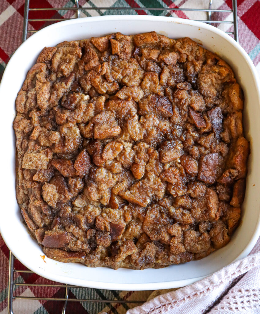 homemade bread pudding in baking dish out of the oven cooling
