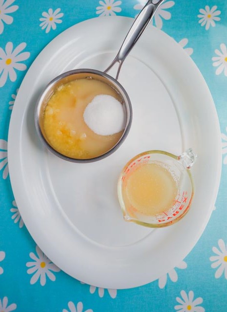 canned pineapple and sugar in saucepan and gelatin dissolved in water