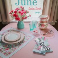 june dinner table setting for ladies lunch with pinks and aquas