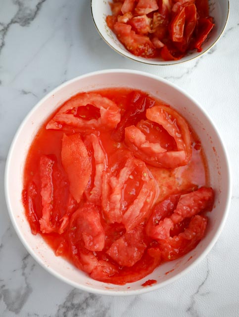 peeled and seeded crushed tomatoes in a bowl 